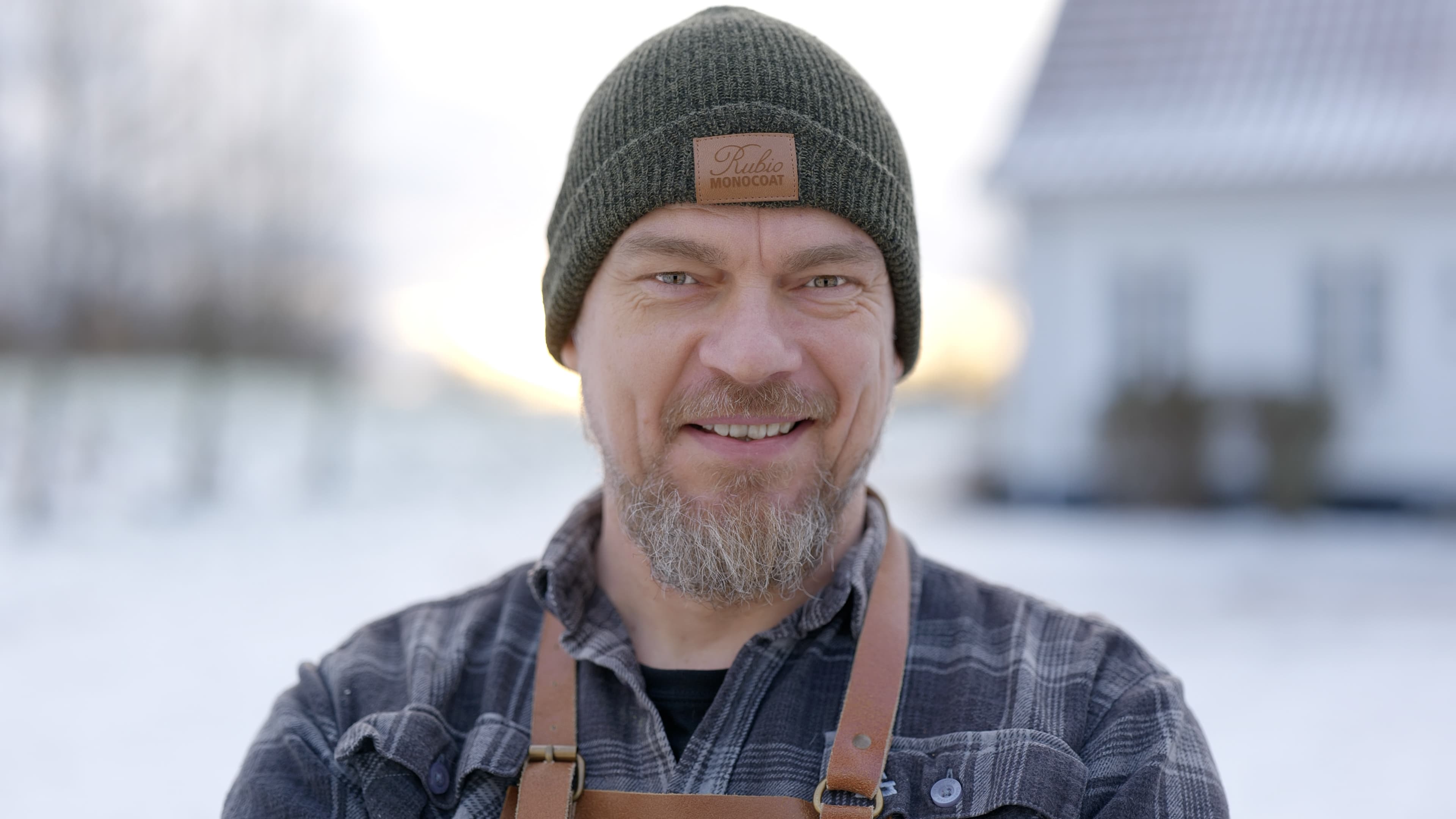 Jesper in his leather apron, outside the workshop